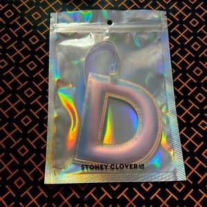 Iridescent D bag charm